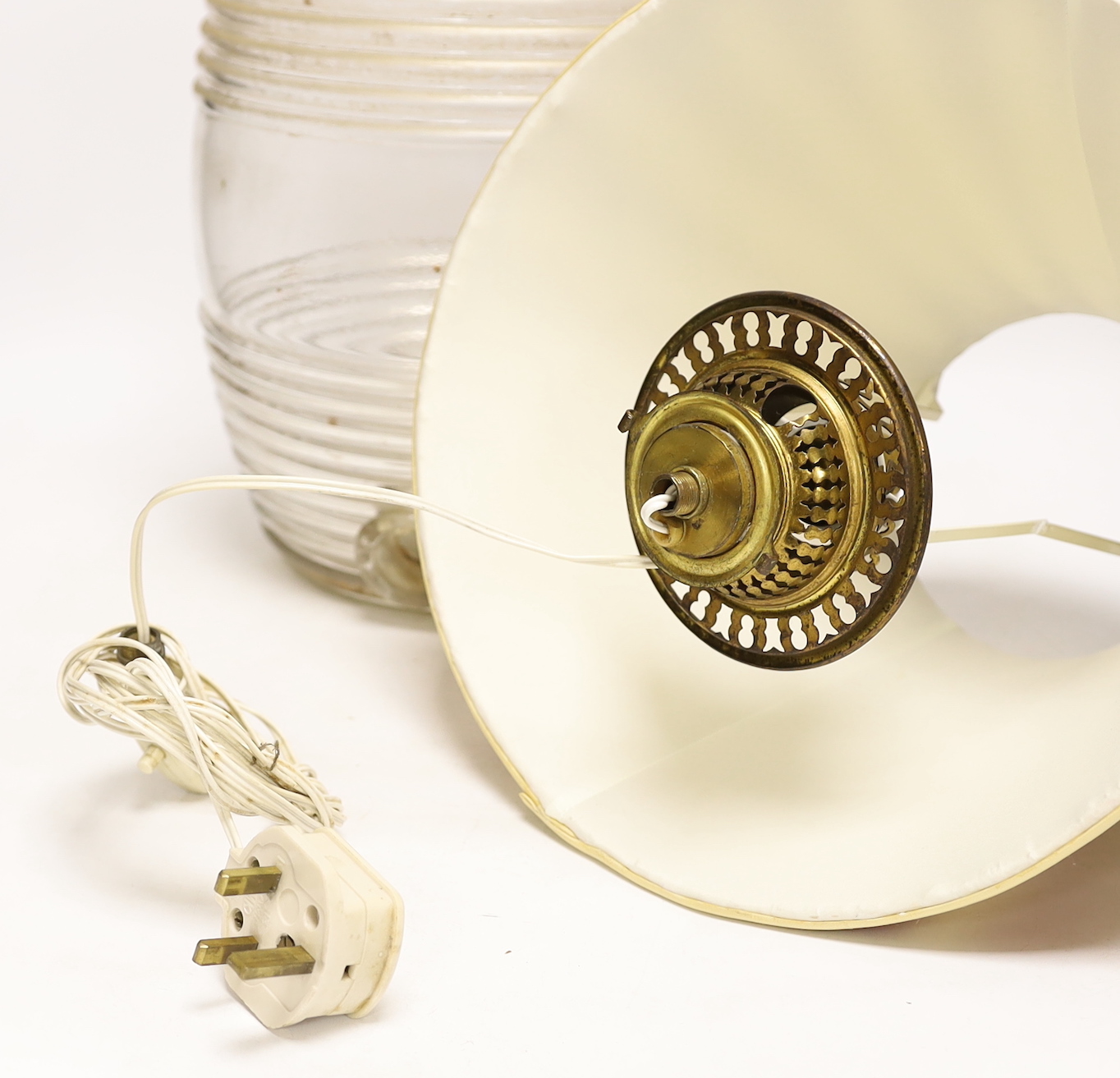 A Victorian glass spirit barrel, mounted as a lamp, 33cm to top of glass
